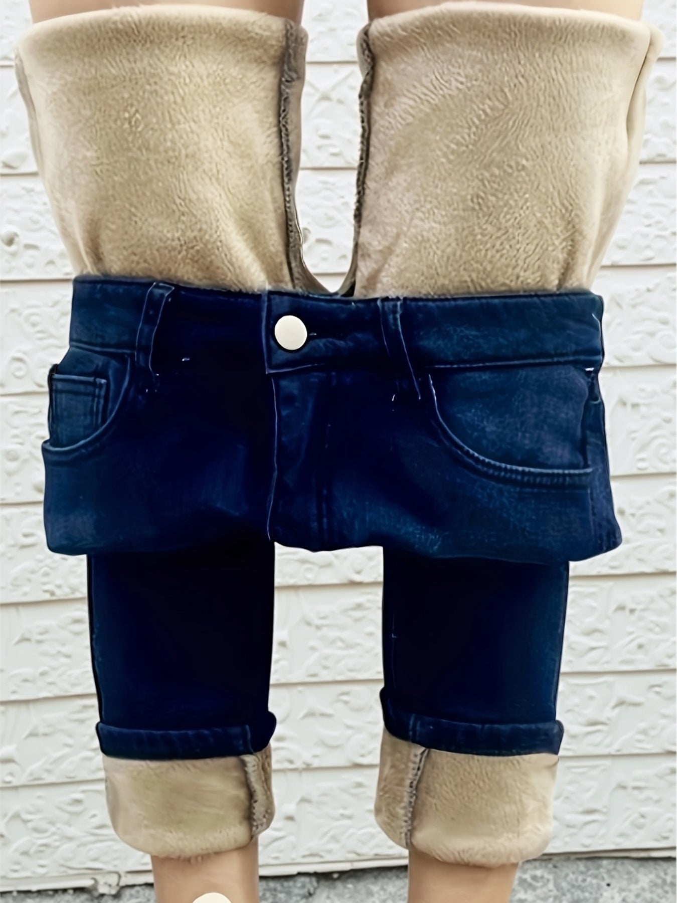 Pantalones ajustados de mezclilla azul para mujer con forro de felpa, diseño desgastado, corte ajustado, elásticos, cálidos e informales para el invierno